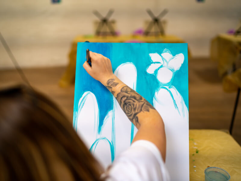 woman painting artwork